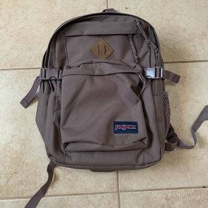 jansport main campus backpack in plum color